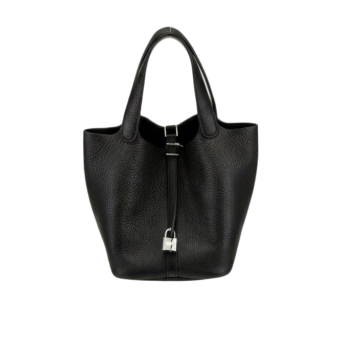 This Brand New, Certified Hermès Picotin 22 is a highly sought-after 2025 collection piece. Crafted in elegant Noir (Black) Swift leather and finished with Palladium Hardware (PHW), this chic bucket bag is a timeless luxury asset.