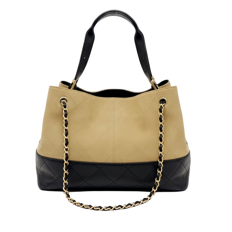 This New, Certified Authentic Chanel 25 Hobo Bag is a rare collector's piece, crafted in sumptuous tan quilted suede and finished with distinctive antique gold hardware.