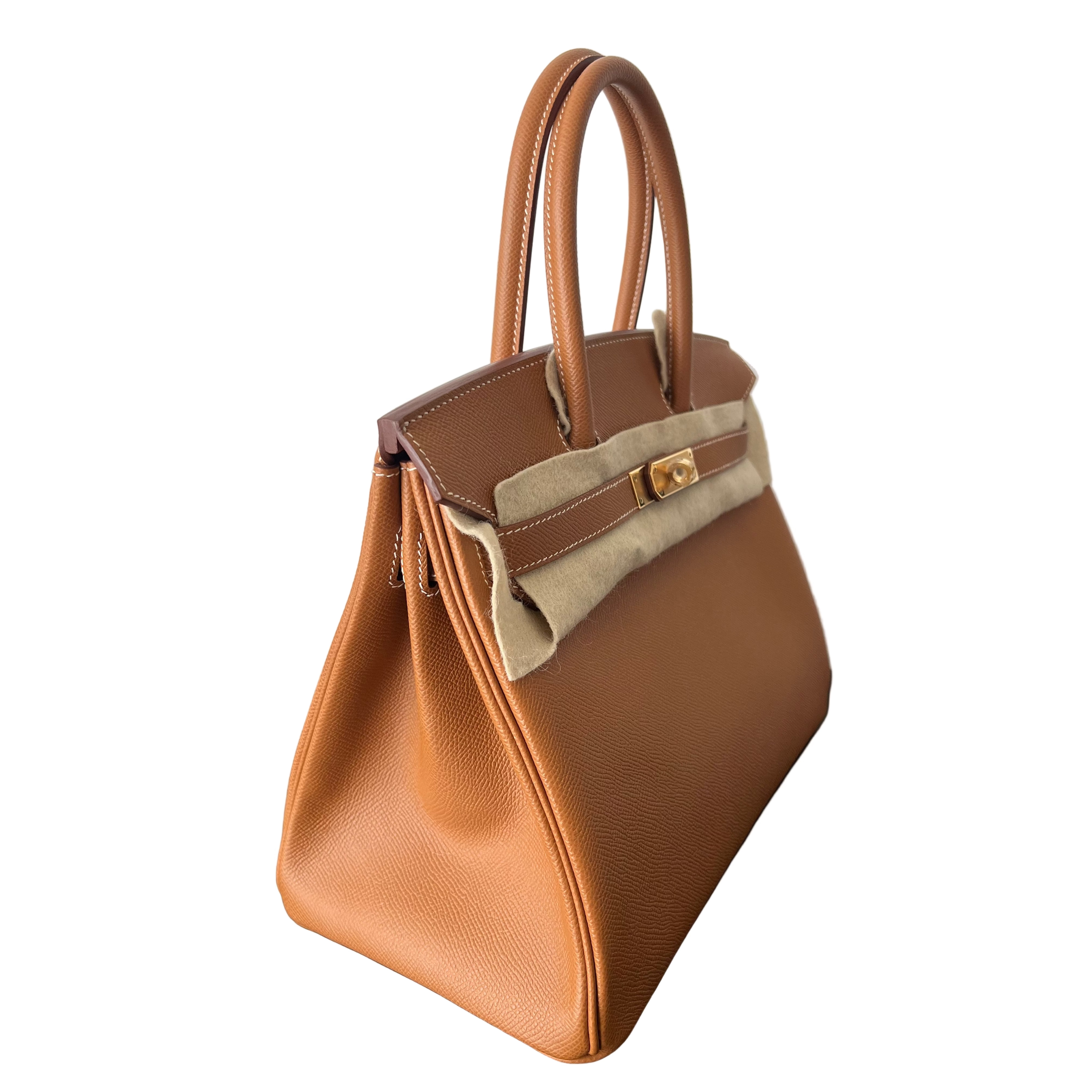 Hermes Birkin 30 handbag with beige accents on a white background