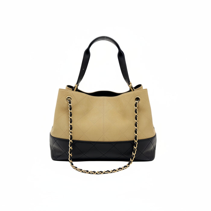 This New, Certified Authentic Chanel 25 Hobo Bag is a rare collector's piece, crafted in sumptuous tan quilted suede and finished with distinctive antique gold hardware.